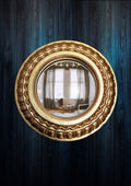 Golden Scalloped Witch's Eye Mirror – handcrafted mystical wall decor with rich golden scalloped resin frame